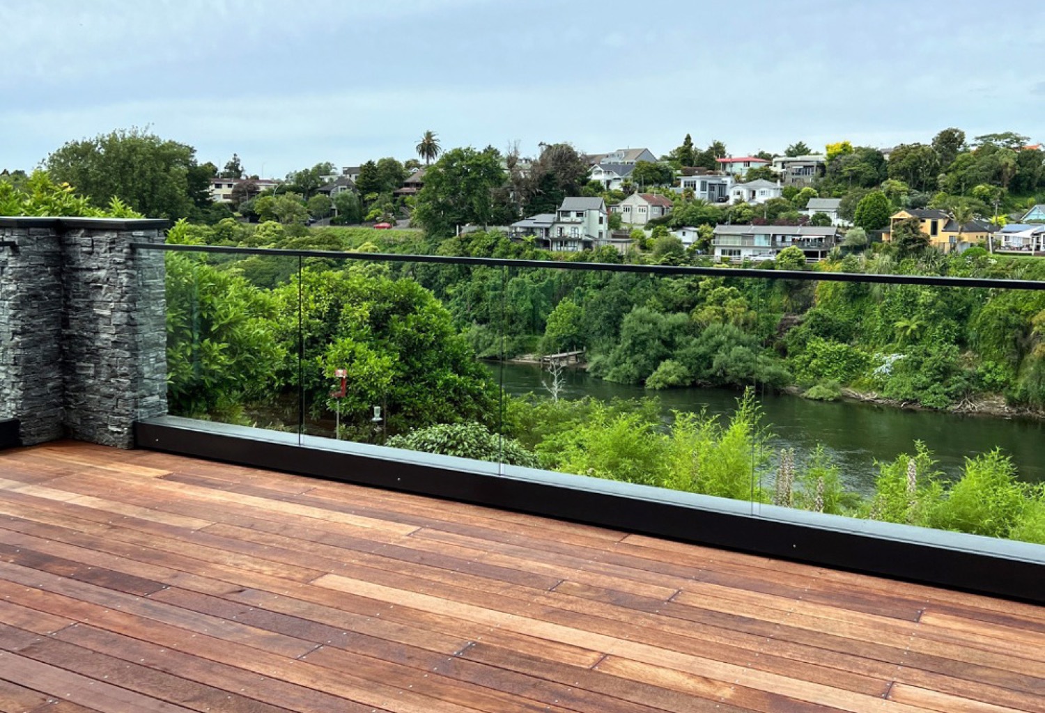 Frameless glass balustrade overlooking a river in Tauranga