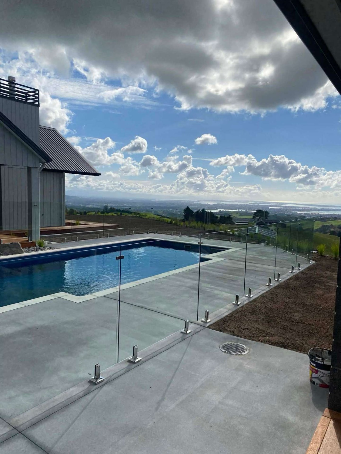 Frameless glass pool fence with unobstructed views in Tauranga
